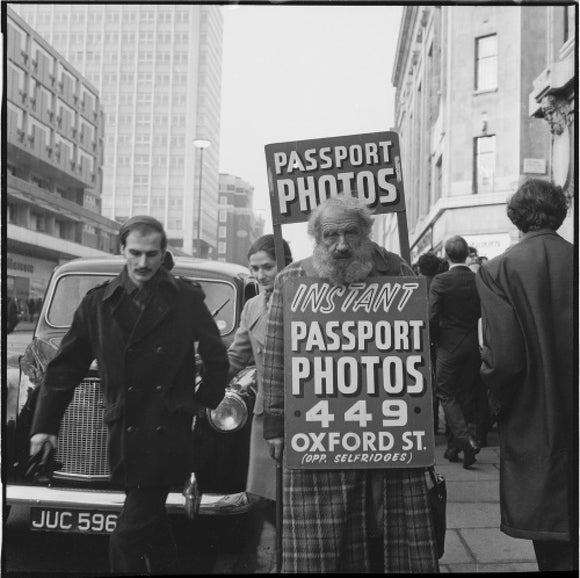 Sandwich-board advertising man: 20th century