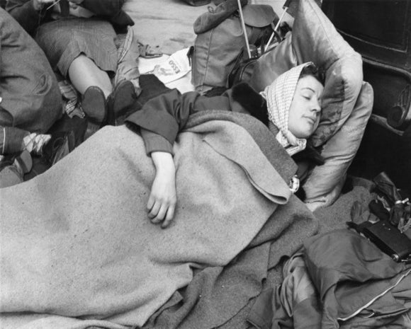 A woman camps out on the street for Queen Elizabeth's Coronation: 1953