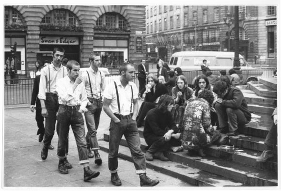 Group of skinheads & hippies in Piccadilly Circus, 1969